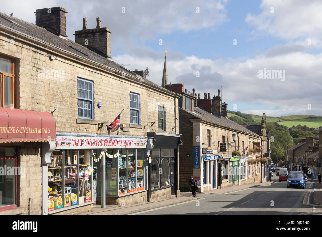 Shops and businesses, quiet on this Wednesday afternoon as it is 'Early Closing Day', on Bridge Street, Ramsbottom, Lancashire Stock Photo