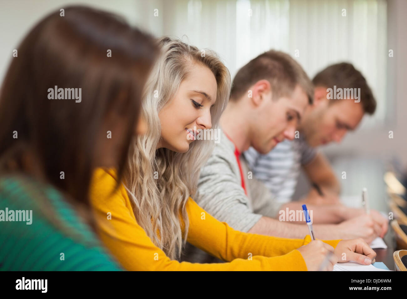 Focused casual students having an exam Stock Photo