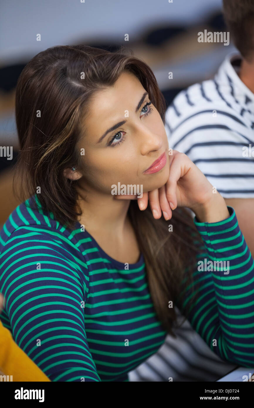 Brunette serious student looking away Stock Photo