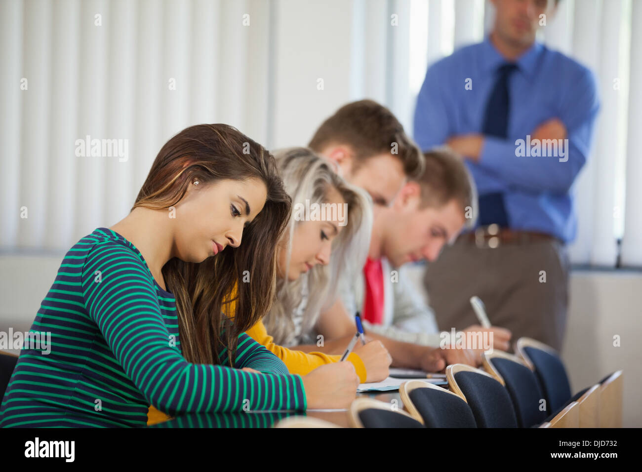 Serious students having an exam Stock Photo