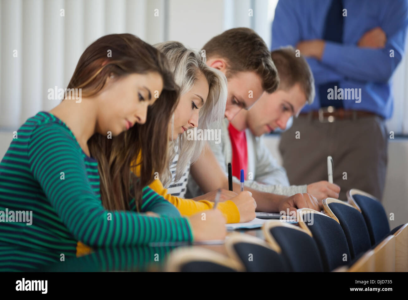 Calm students having an exam Stock Photo