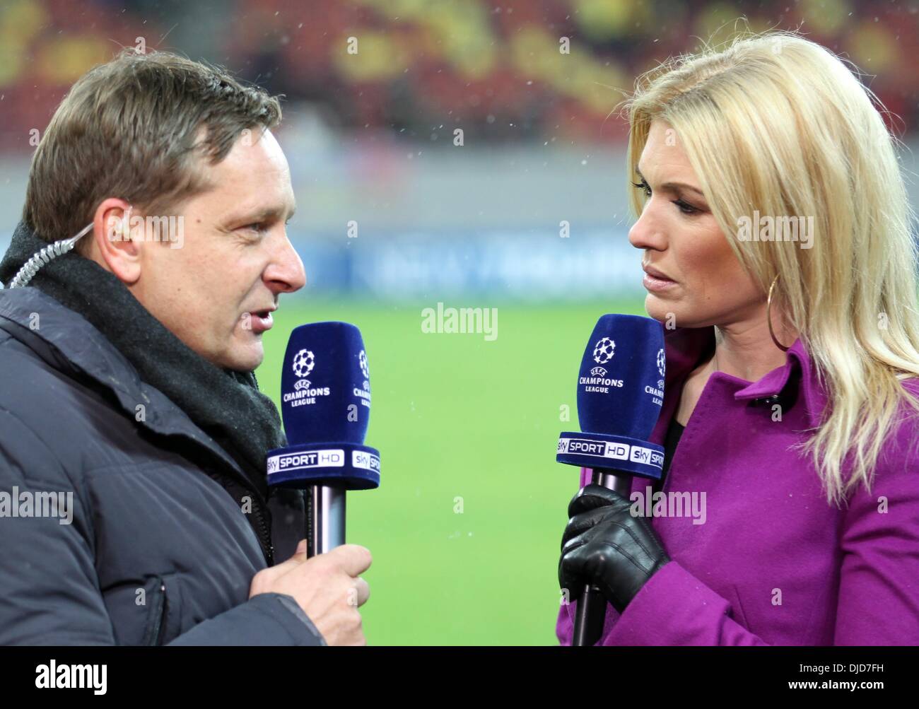 Bucharest, Romania. 26th Nov, 2013. Managing director Horst Heldt (L) of Schalke is interviewed by Jessica Kastrop prior to the UEFA Champions League Group E soccer match between FC Steaua Bucharest and FC Schalke 04 at National Arena stadium, in Bucharest, Romania, 26 November 2013. Photo: Friso Gentsch/dpa/Alamy Live News Stock Photo