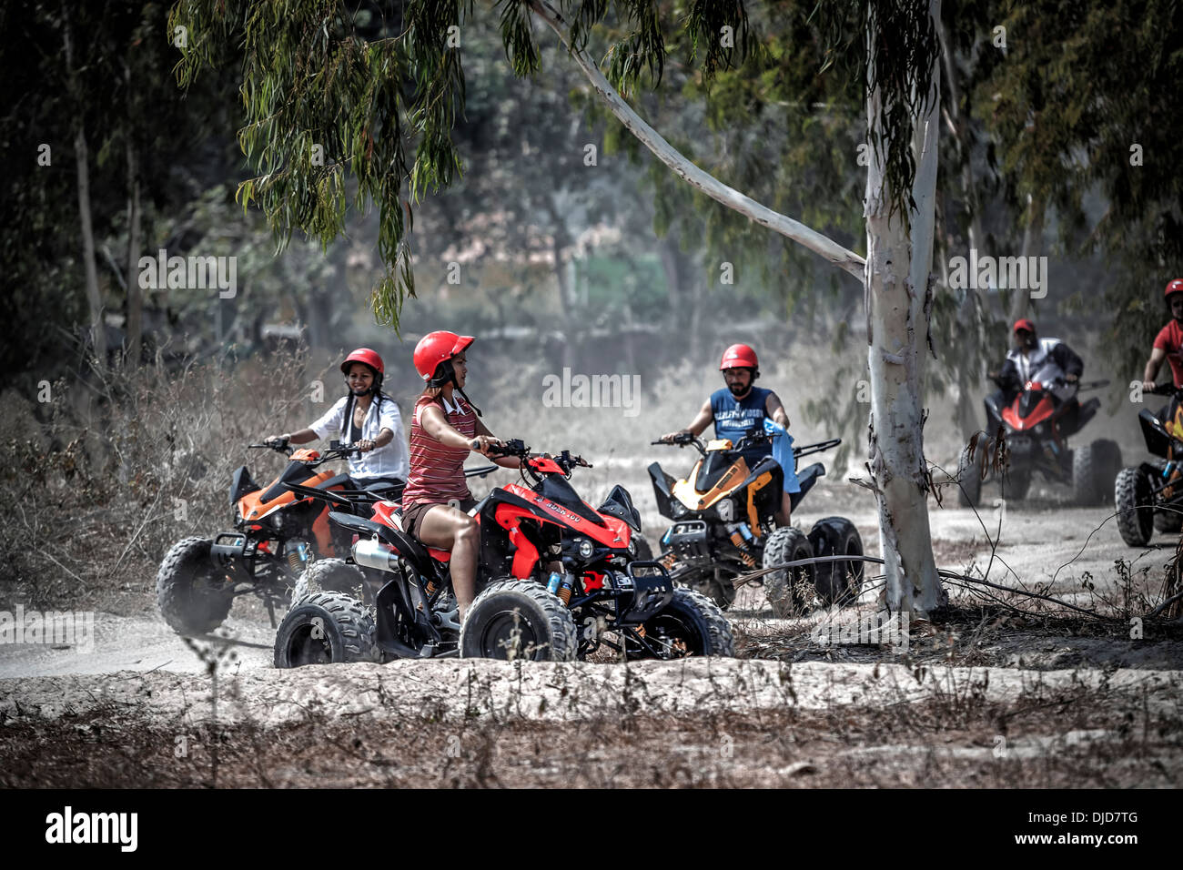 Mixed group of ATV quad bike  riders. Thailand S. E. Asia Stock Photo