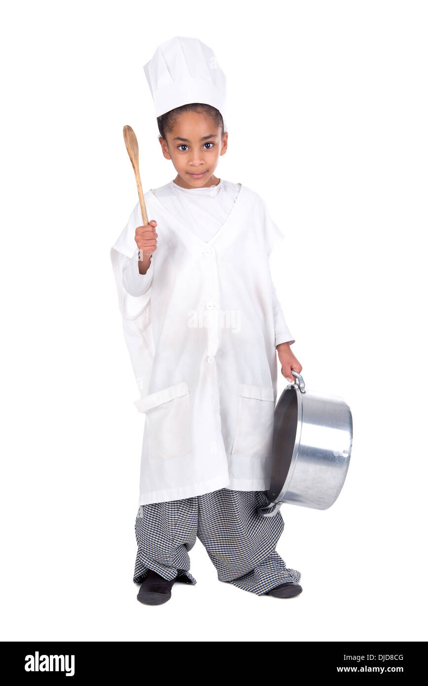 Young girl posing with adult chef's uniform Stock Photo