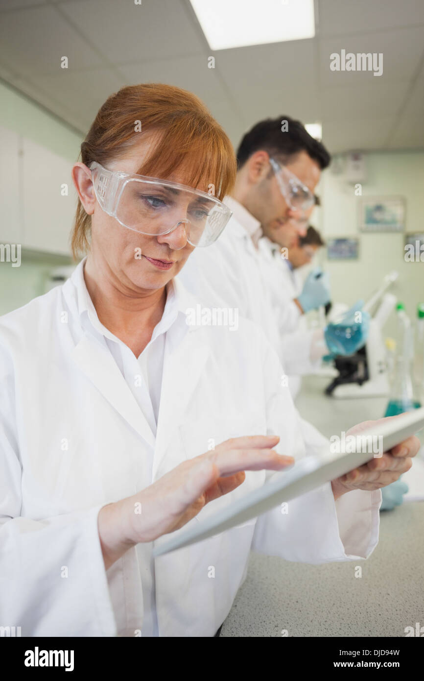 Mature woman using her tablet Stock Photo