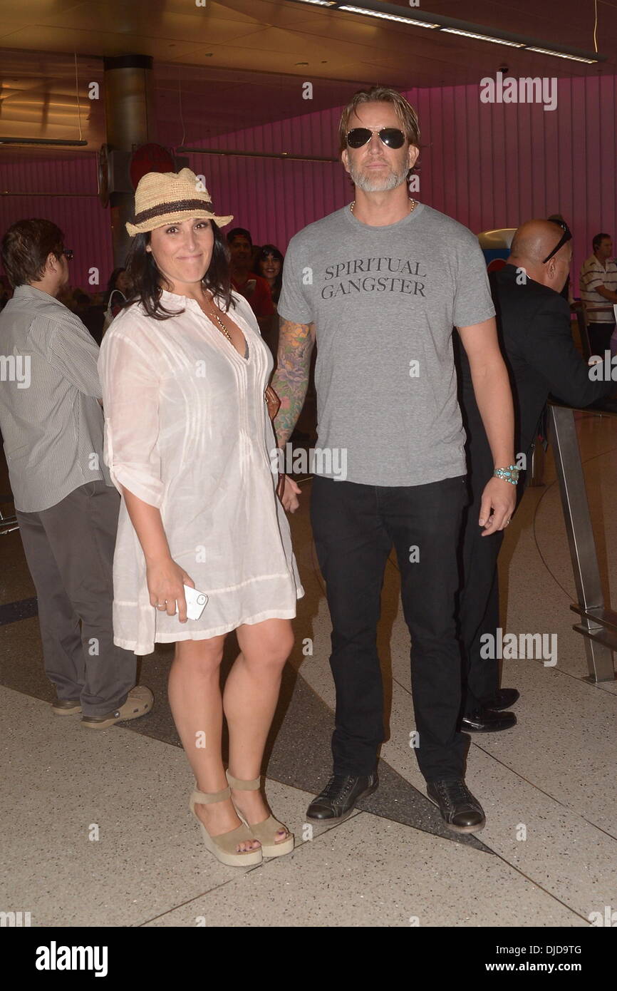 Ricki Lake and husband Christian Evans seen at LAX airport Los Angeles