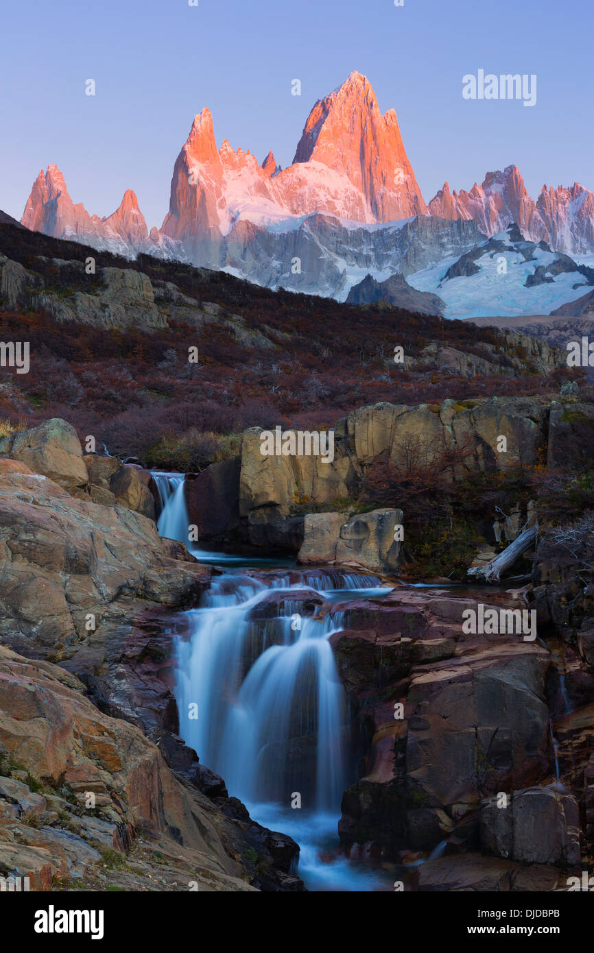 Waterfalls of Arroyo del Salto river with Fitz Roy Massif in the background.Patagonia.Argentina Stock Photo