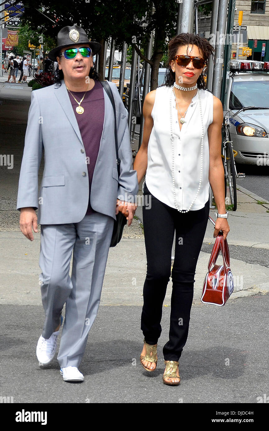 Carlos Santana and wife Cindy Blackman are seen strolling in Soho