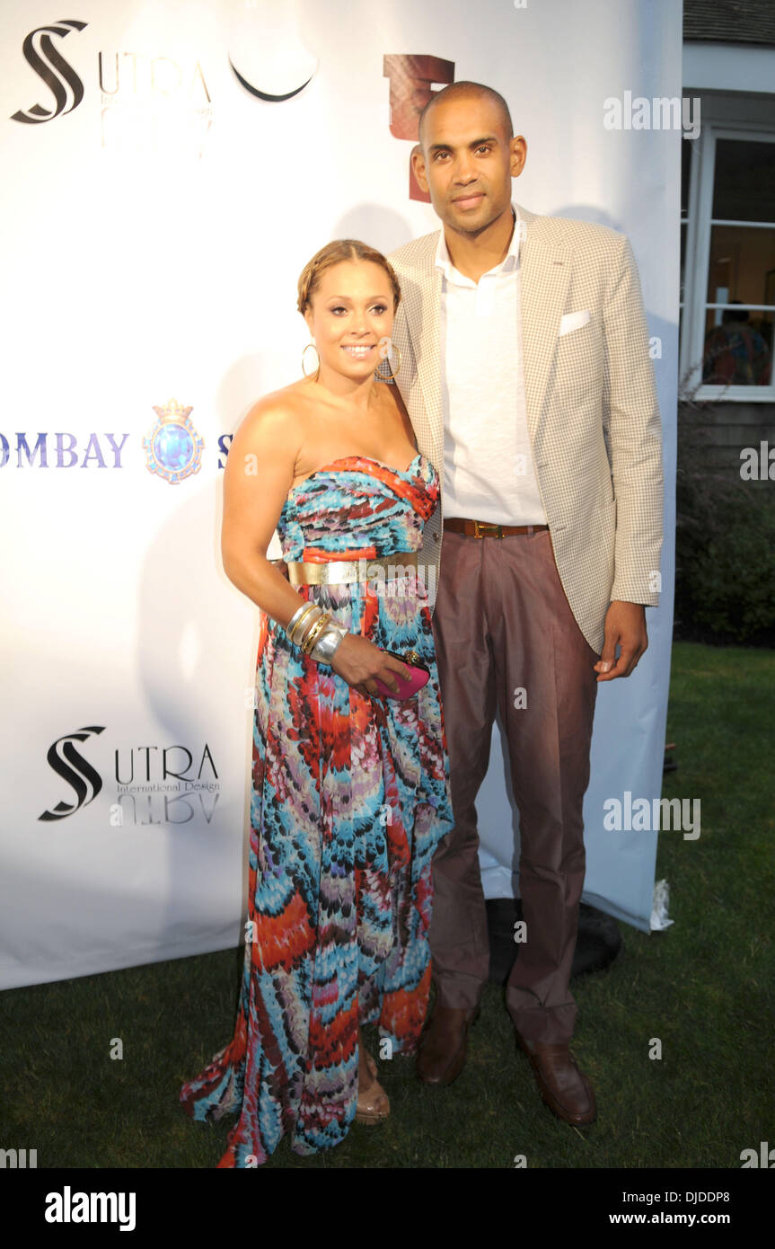 Tamia Hill, Grant Hill 13th Annual Russell Simmons Rush Philanthropic ART FOR LIFE East Hampton, New York - 28.07.12 Stock Photo