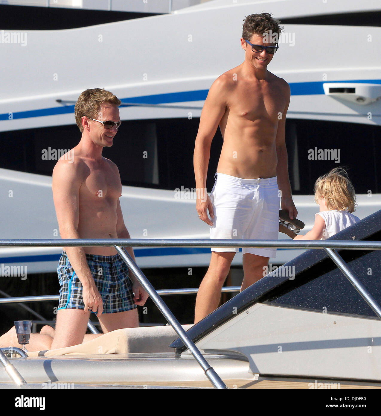 Neil Patrick Harris, Harper Grace and David Burtka Neil Patrick Harris and  his fiance enjoy a day on a yacht with their children after having lunch  with friends Saint-Tropez, France - 02.08.12, image size:1274x1390