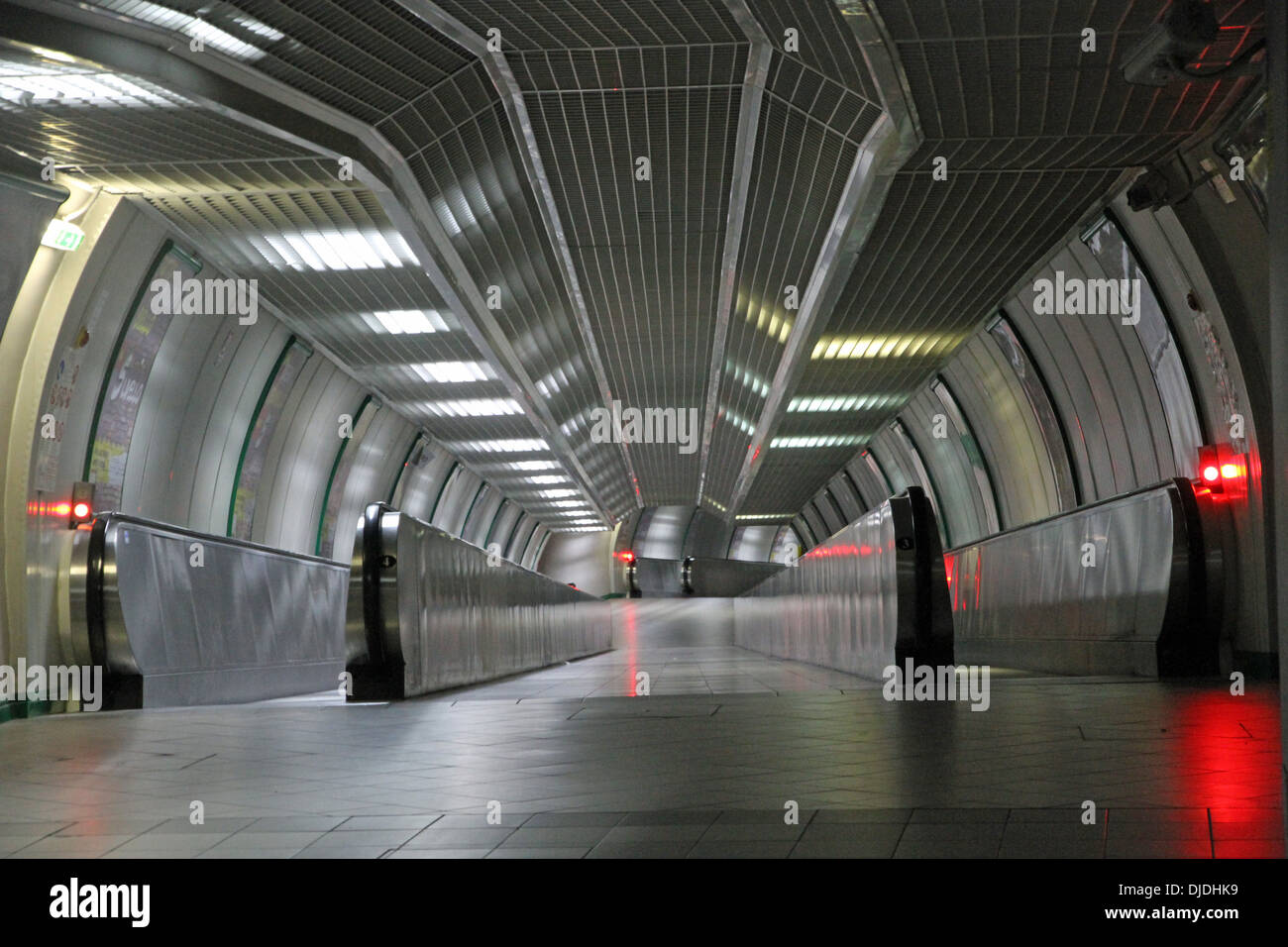 very modern steel escalator inside a terminal of a major metropolis without people Stock Photo