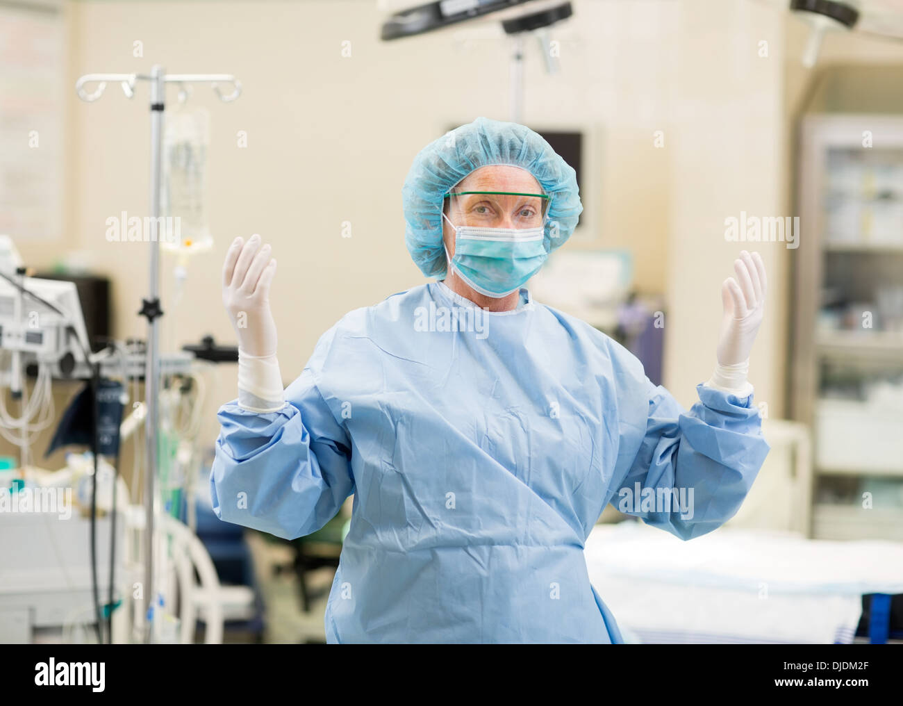 Mature Doctor In Surgical Gown Stock Photo
