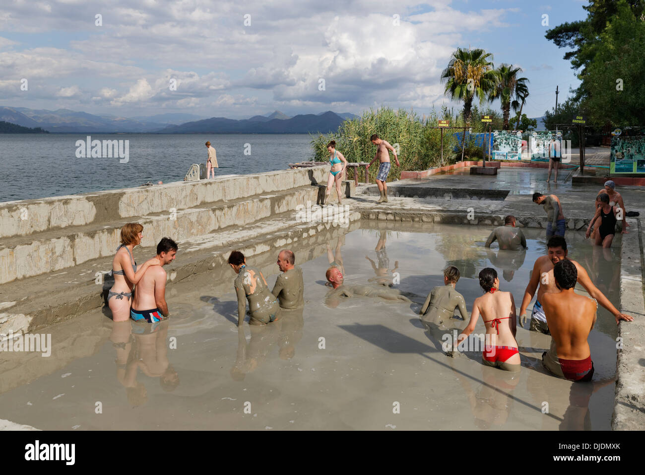 People taking a mud bath, Sultaniye Thermal Baths at Lake Köyceğiz or Köyceğiz Gölü near Dalyan, Muğla Province, Turkish Stock Photo