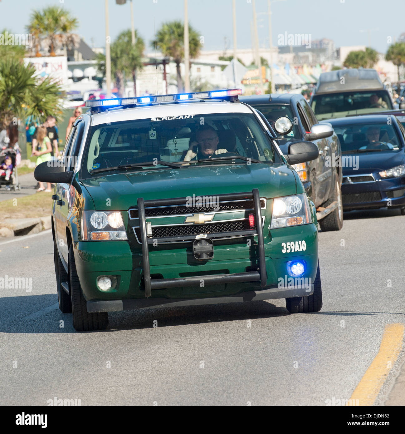 Sargeant's car of the Sheriffs Department driving on a blue light USA Stock Photo