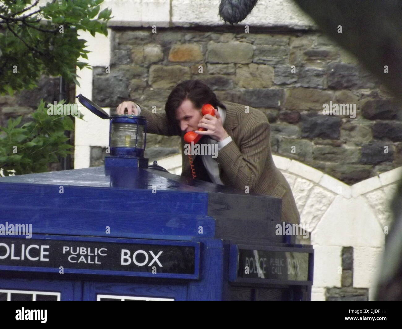 Matt Smith Matt Smith filming a scene for series seven of the popular BBC sci-fi series Dr Who. The Doctor, climbs a ladder and changes a bulb in the lamp on the top of the TARDIS. He proceeds to leave a voice-mail message for Amy Pond and Rory Williams. Stock Photo