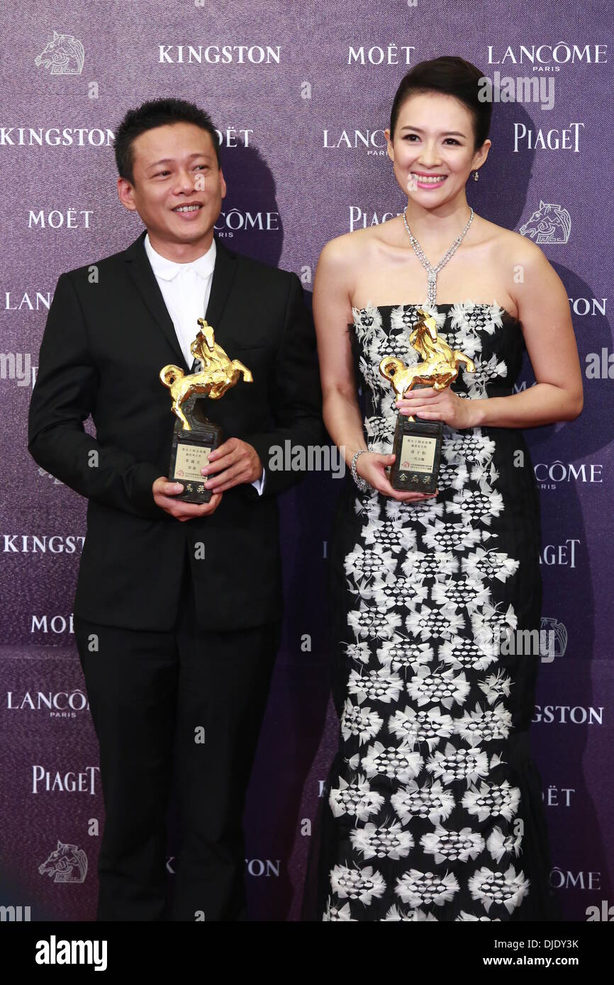 Taipei, China. 23rd Nov, 2013. Zhang Ziyi and Li Kangsheng pose for