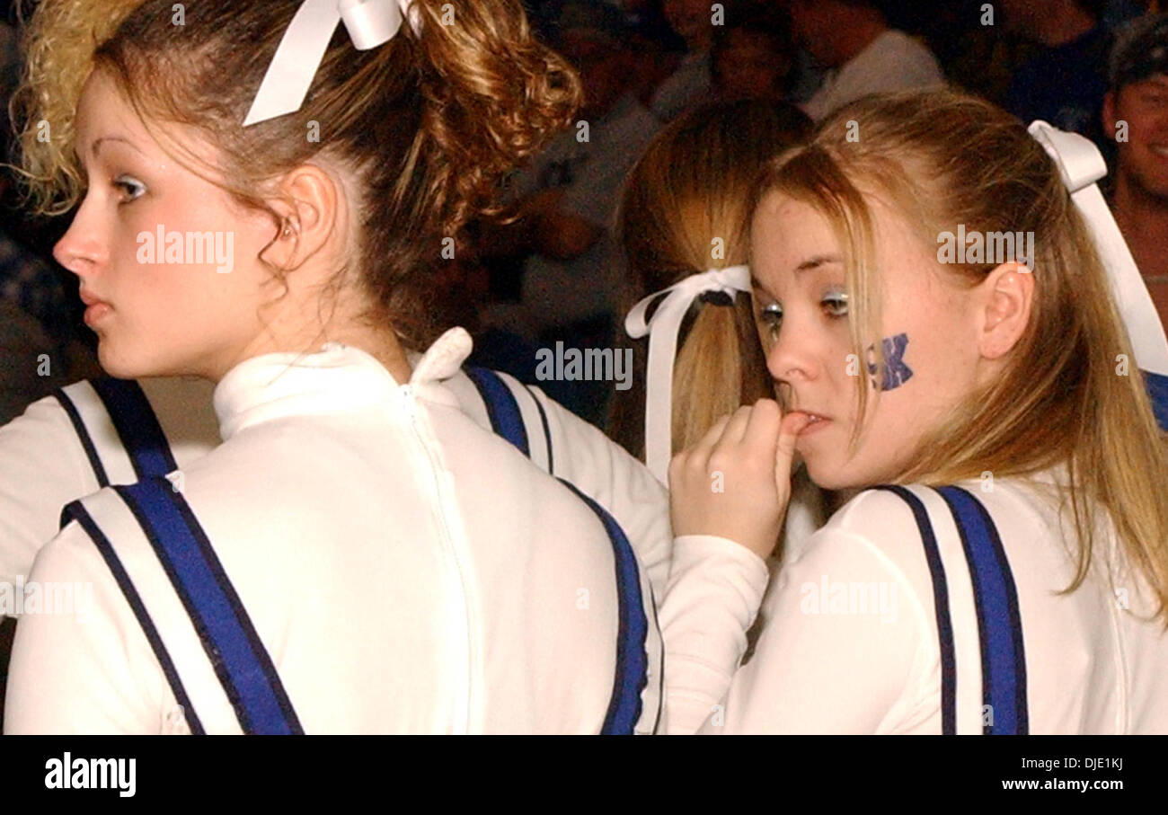 Mar 15, 2003 - Union, Kentucky, USA - Two Simon Kenton cheerleaders react to thier tem trailing St. Henry by 10 points during 2nd half of the game. Henry High School won over Simon Kenton High School  49 to 53 for the Kentucky 9th Region Boys Basketball Championship.  (Credit Image: © Ken Stewart/ZUMA Press) Stock Photo