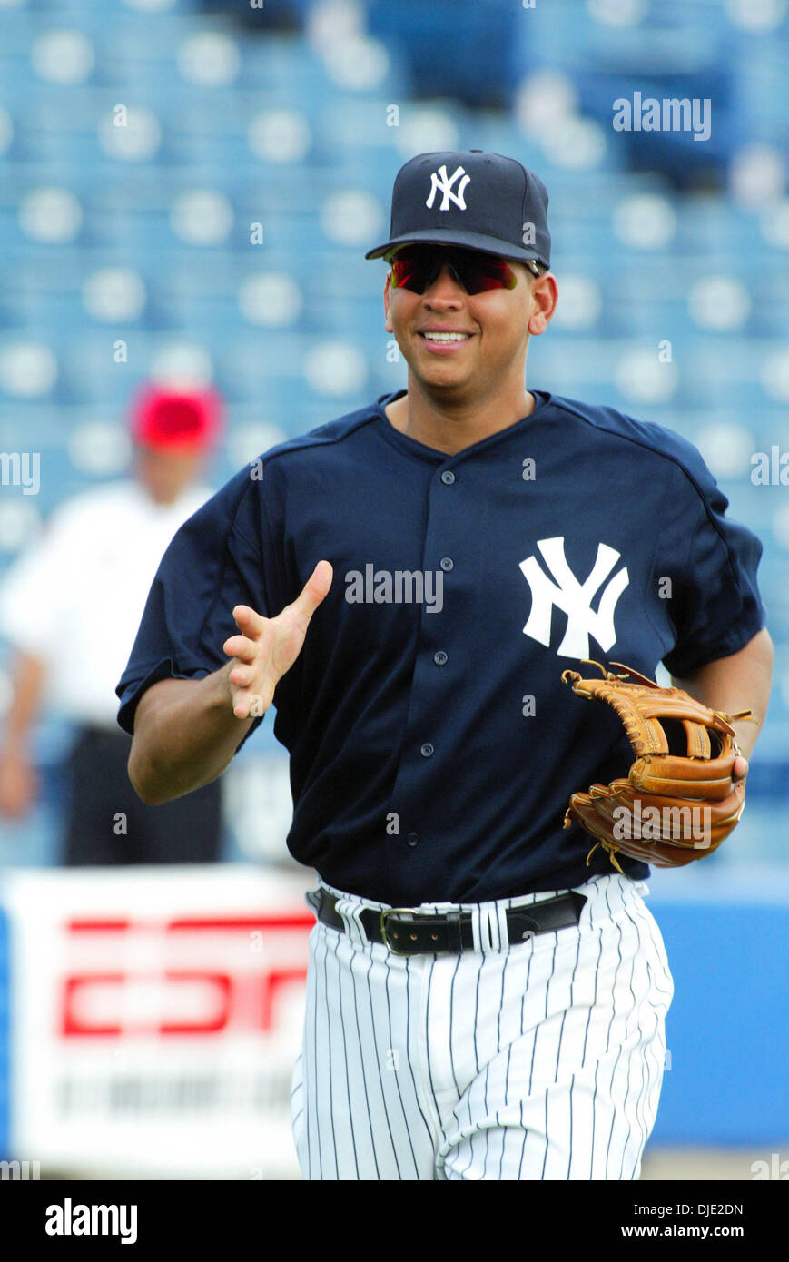 Mar 05, 2004; Tampa, FL, USA; ALEX RODRIGUEZ runs off the field after  pre-game warm-ups before a spring training game with the Philadelphia  Phillies at Legends Field. New York defeated Philadelphia 7-5