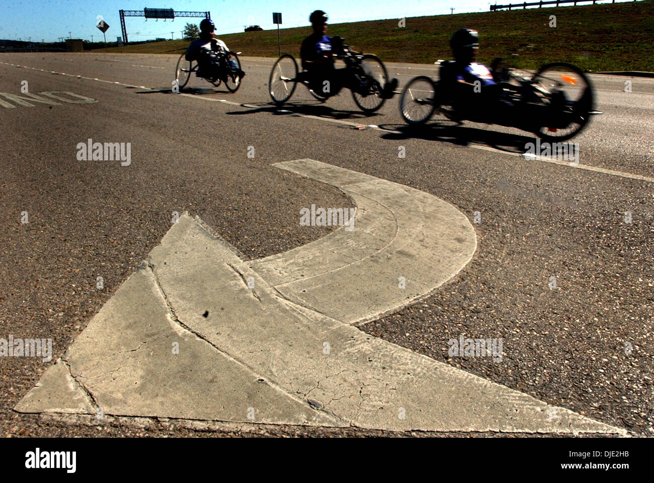 Mar 09, 2004; San Antonio, TX, USA; Disabled hand cycling athletes from the VA hospital and Warm Springs rehablitation practice their cycling on Loop 1604 near UTSA. Some of the group will be taking part in the National Disabled Veterans Winter Sports Clinic in April. Stock Photo