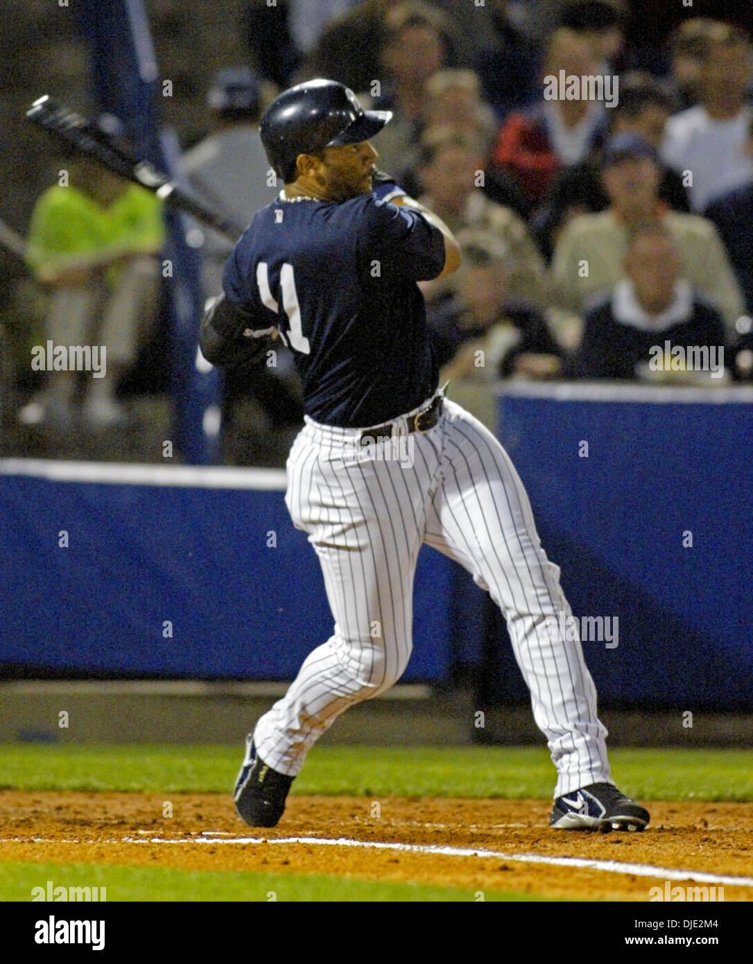 March 12, 2004; Tampa, FL, USA; New York Yankees' outfielder Gary Sheffield  gets a base hit RBI scoring Derek Jeter for the 1st run in the 1st inning  in a spring training