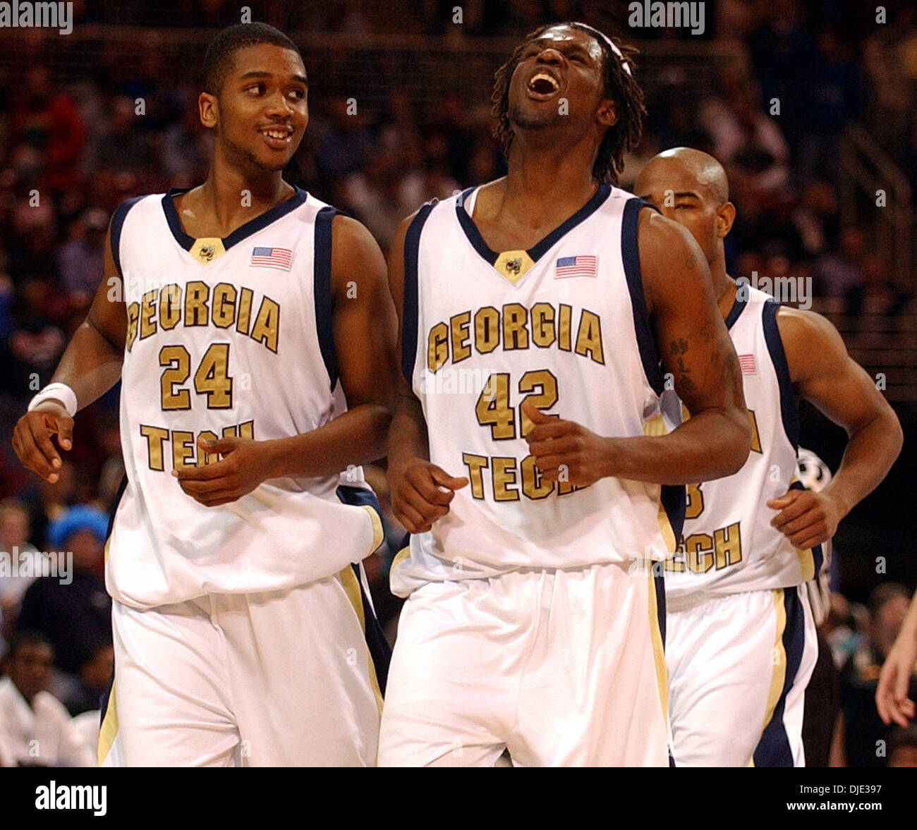 Mar 26, 2004; St. Louis, MO, USA;  Georgia Tech's CLARENCE MOORE reacts Friday night March 26, 2004 at the Edward Jones Dome in St. Louis, Mo. near the end of their Sweet 16 win over Nevada while teammate MARVIN LEWIS watches. Tech won 72-67 and faces Kansas Sunday in the Elite 8. Stock Photo