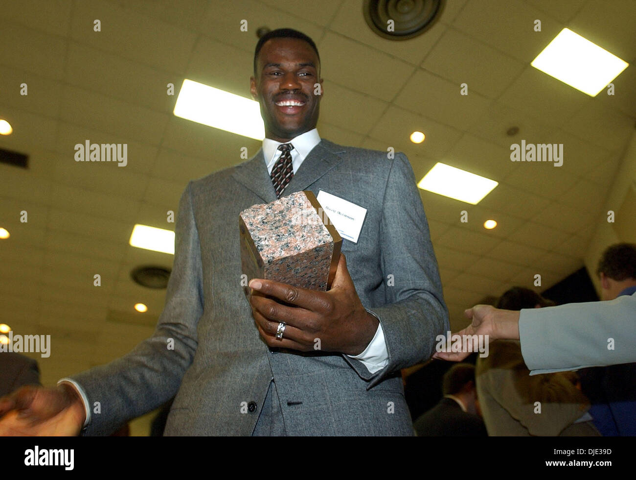 Mar 26, 2004; San Antonio, TX, USA;Former San Antonio Spurs player DAVID ROBINSON, who is the main benefactor of the Carver Academy, smiles after receiving the Texan of the Year award from Gov. Rick Perry in New Braunfels on Friday, March 26, 2004. Stock Photo