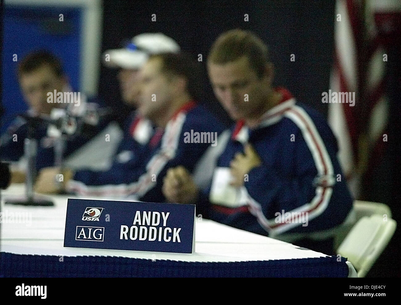 Apr 05, 2004; Delray Beach, FL, USA; Andy Roddick's name plate sits on the table away from the rest of the US Davis Cup team during a press conference at the Delray Beach Stadium and Tennis Center Monday, April 5, 2004, as headway picks up towards the big match against Sweden this weekend. Roddick was given the day off by team captain Patrick McEnroe after Roddick's win in the Nasd Stock Photo