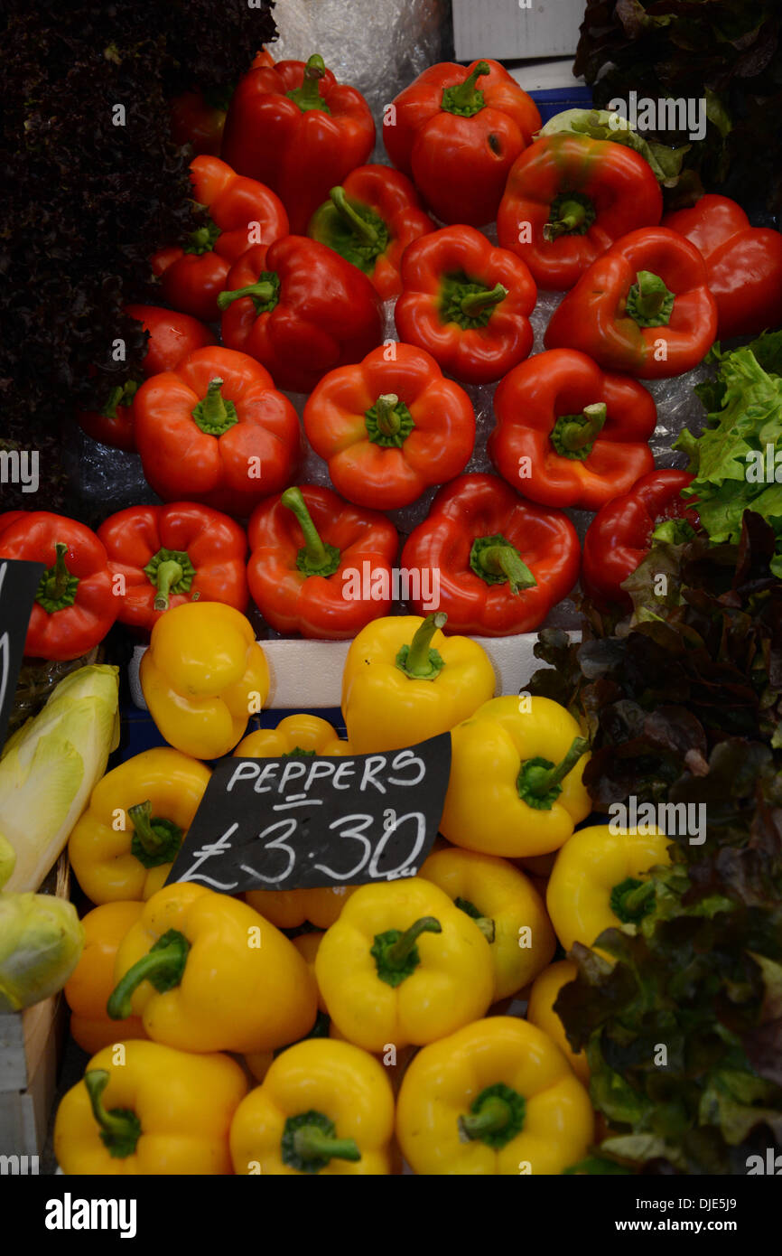 Red and Yellow Bell Peppers For Sale On A Market Stall Stock Photo - Alamy