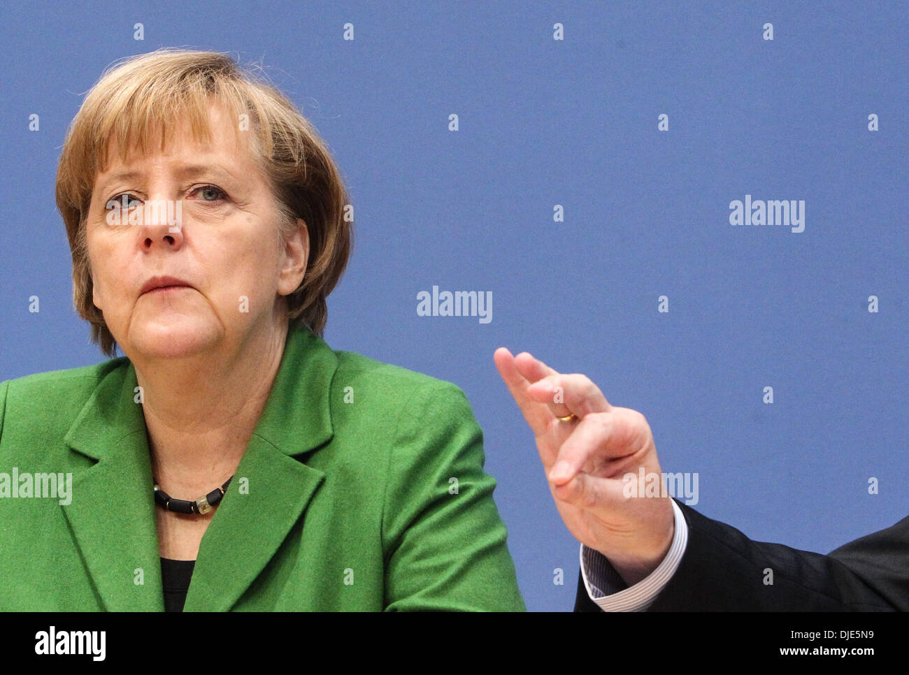 Berlin, Germany. 27th Nov, 2013. German Chancellor Angela Merkel attends a press conference in Berlin, Germany, on Nov. 27, 2013. Leaders from Germany's main parties signed provisionally a coalition agreement on Wednesday, paving the road for forming a new government two months after a federal election. Credit: Zhang Fan/Xinhua/Alamy Live News Stock Photo
