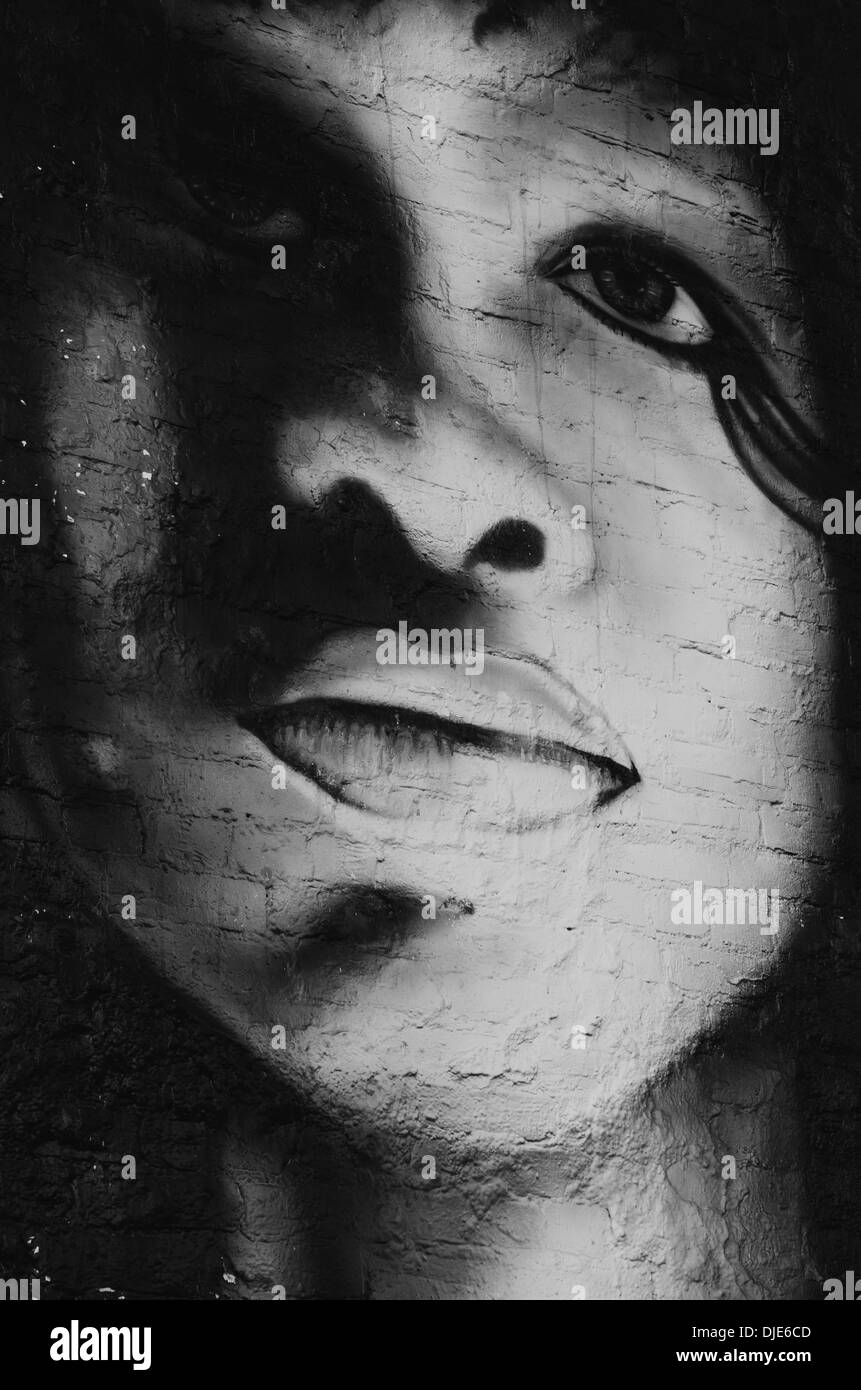 Realistic graffiti of afroamerican woman on a brick wall in Deep Ellum. Dallas, Texas. Stock Photo