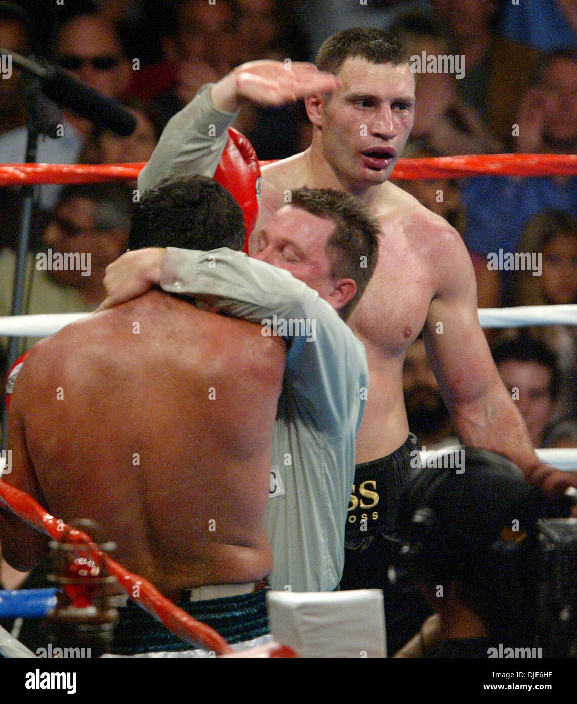 Apr 24, 2004; Los Angeles, CA, USA; Referee JON SCHORLE protects CORRIE