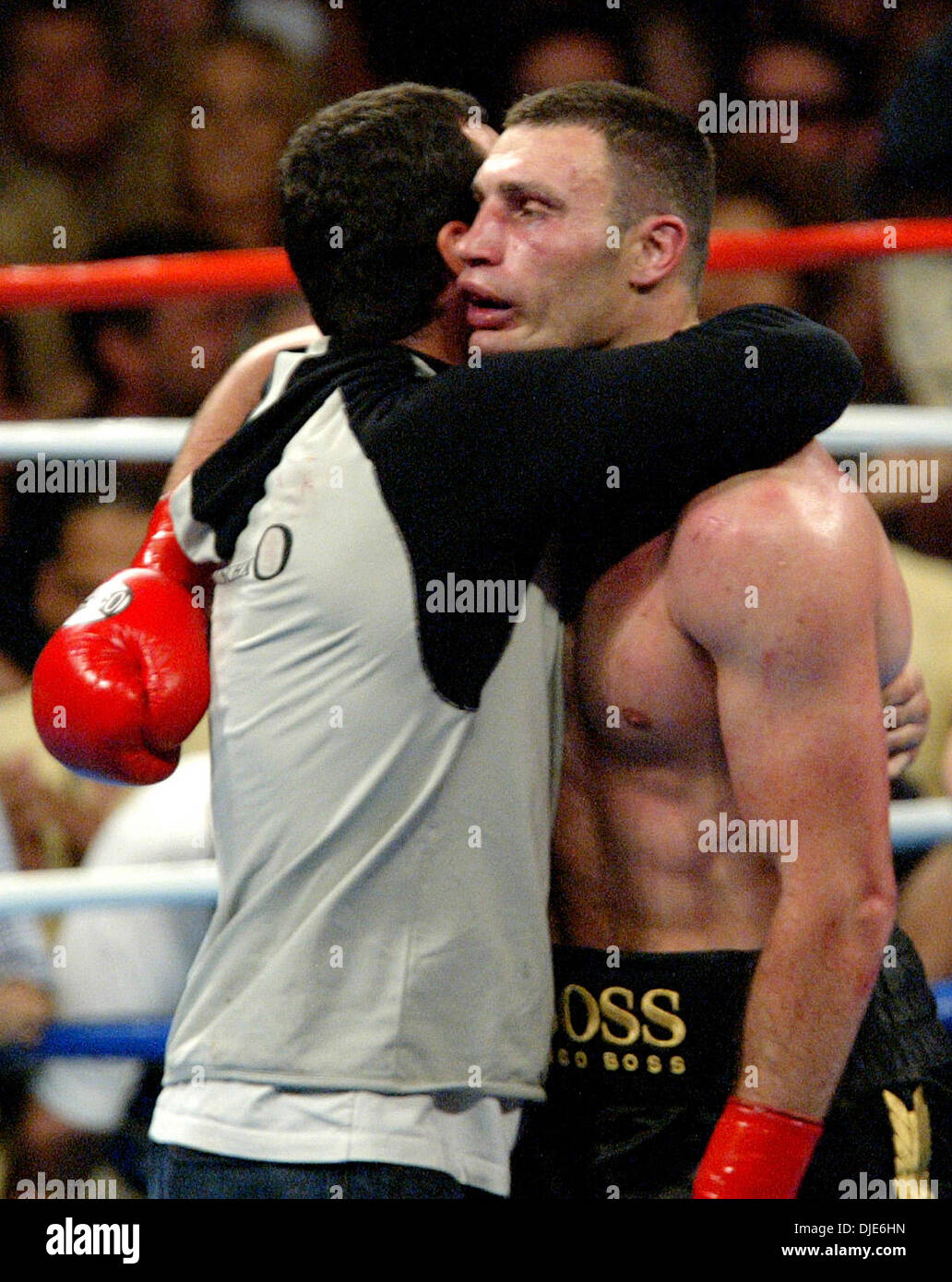 Apr 24, 2004; Los Angeles, CA, USA; Boxer VITALI KLITSCHKO (R) receives