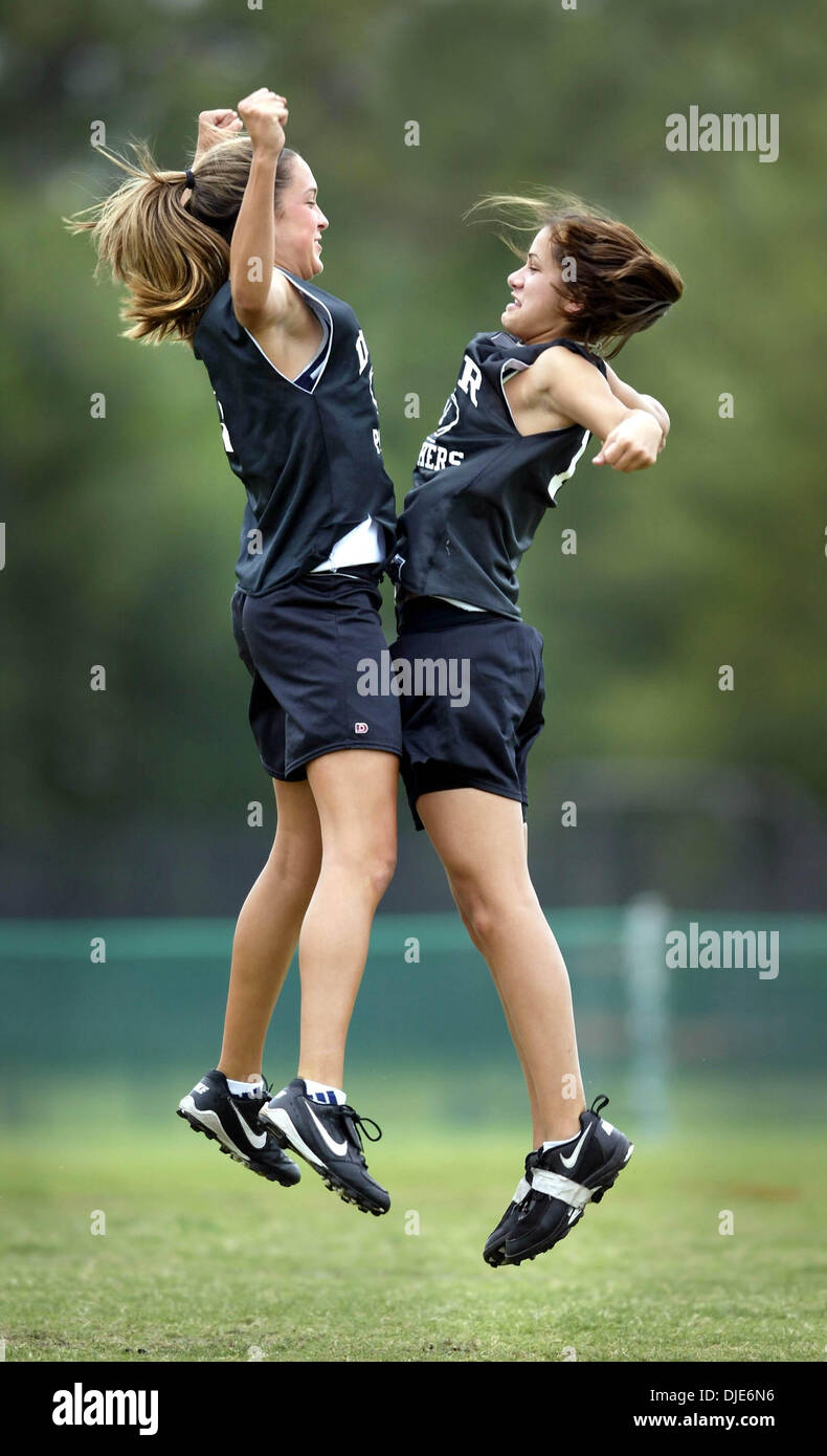 Apr 28, 2004; Palm Beach, FL, USA; William T. Dwyer High School's AMELIA  REYMANN (L) and AMANDA CONFORTI (R) demonstrate how they do a chest bump  after making a big play or