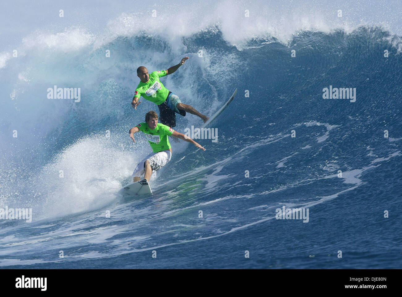 May 24, 2004; Tavarua Island, Fiji; Six times ASP world surfing champion American KELLY SLATER (Florida, USA) (pictured front) and ASP world number three Australian TAJ BURROW (Western Australia) share a wave in the Kelly Slater Invitational. Slater invited 11 of the worlds greatest surfers and several celebrities to the island paradise to showcase surfing to the celebrities and ex Stock Photo