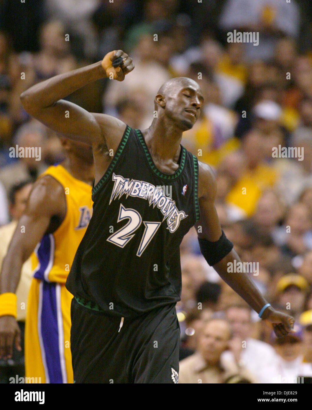 May 27, 2004; Los Angeles, CA, USA; Minnesota Timberwolves player KEVIN GARNETT (21) gets upset with a call by the referee during the fourth quarter of game 4 of the Western Conference Finals at the Staples Center. The Lakers defeated the Timberwolves 92 - 85. Stock Photo