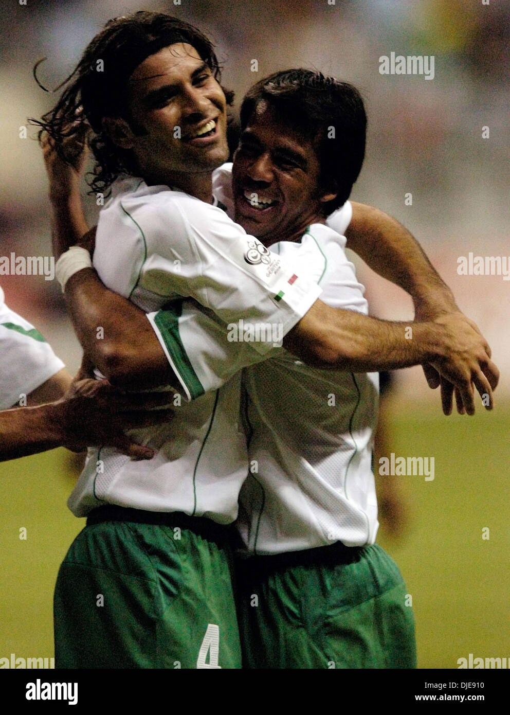 Jun 19, 2004; San Antonio, TX, USA; Mexico's RAFAEL MARQUEZ (L) celebrates his goal with teammate PAVEL PARDO against Dominica in the first half of their World Cup Qualifier at the Alamodome. Stock Photo