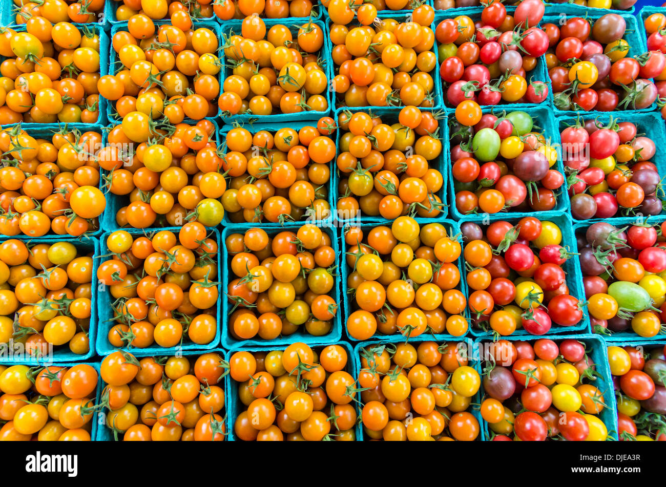 Yellow cherry tomatoes in baskets at the farmers market Stock Photo - Alamy