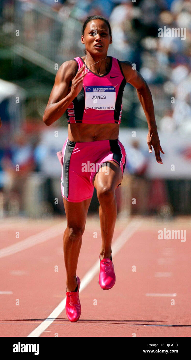 Jul 09, 2004; Sacramento, CA, USA; MARION JONES finishes her 100 meter