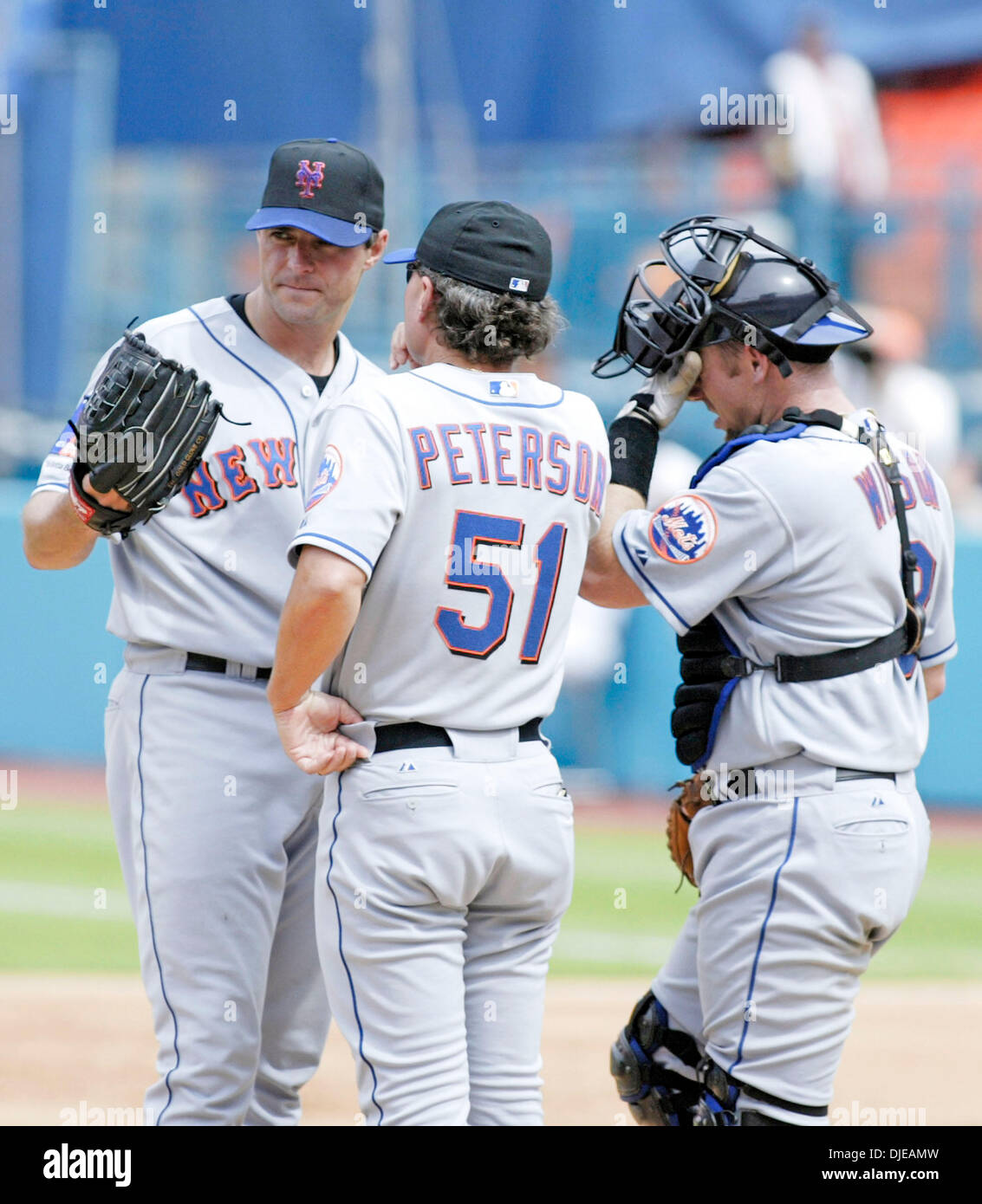Jul 11, 2004; Miami, FL, USA; New York Mets' catcher VANCE WILSON, right. and pitching coach
