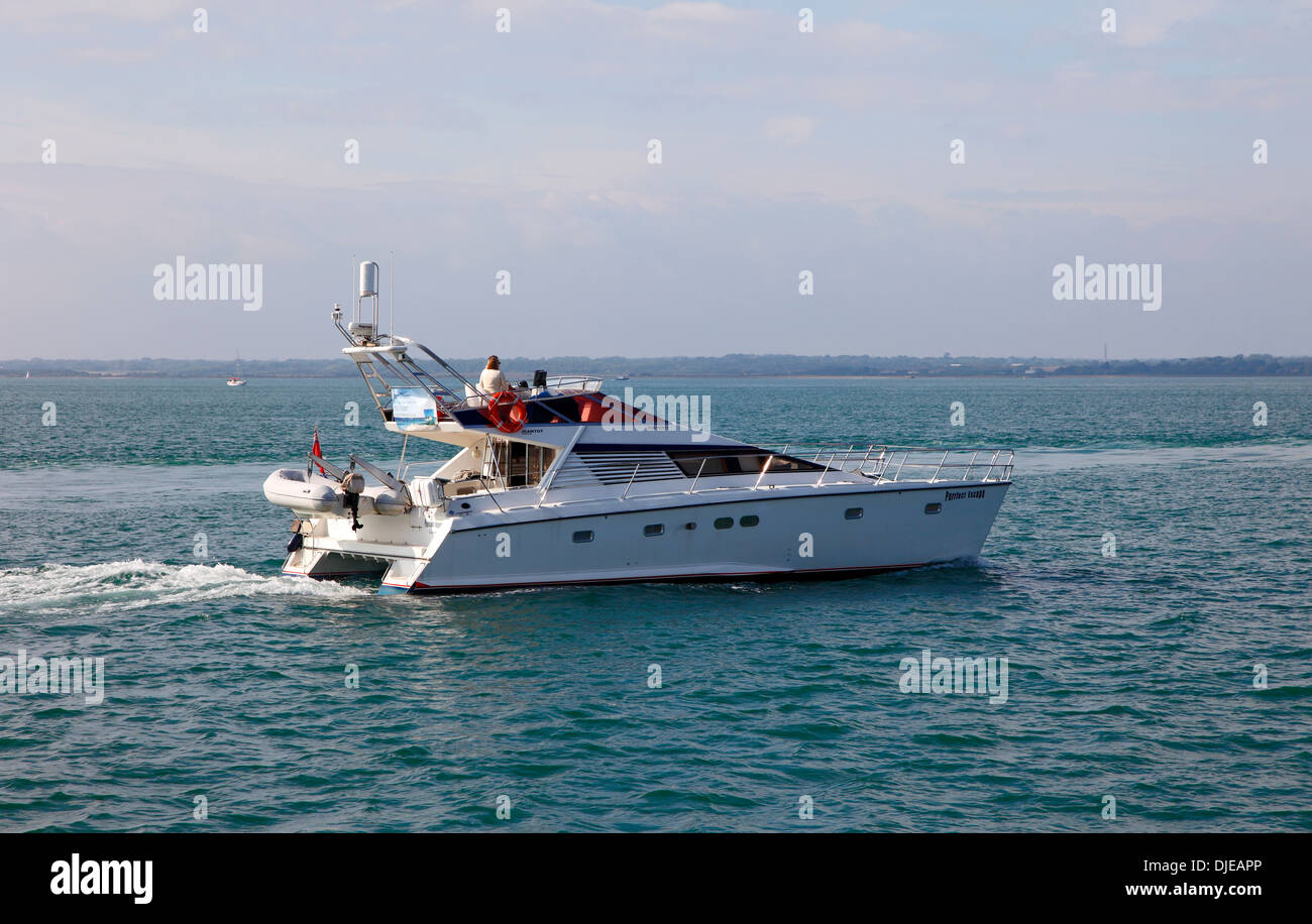 Motor yacht Purfect Escape on the Solent out of Yarmouth Isle of Wight Hampshire England Stock Photo