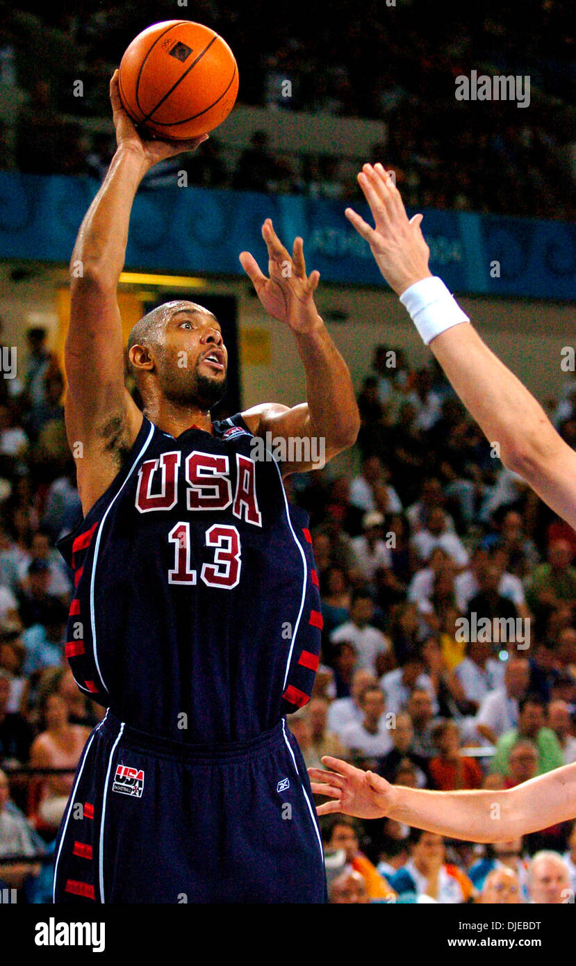 Aug 26, 2004; Athens, GREECE; U.S. Olympic basketball player TIM DUNCAN  shoots Thursday Aug. 26, 2004 in Athens, Greece over Spain's PAU GASOL  during their quarterfinal match-up during the XXVIII Olympiad. The