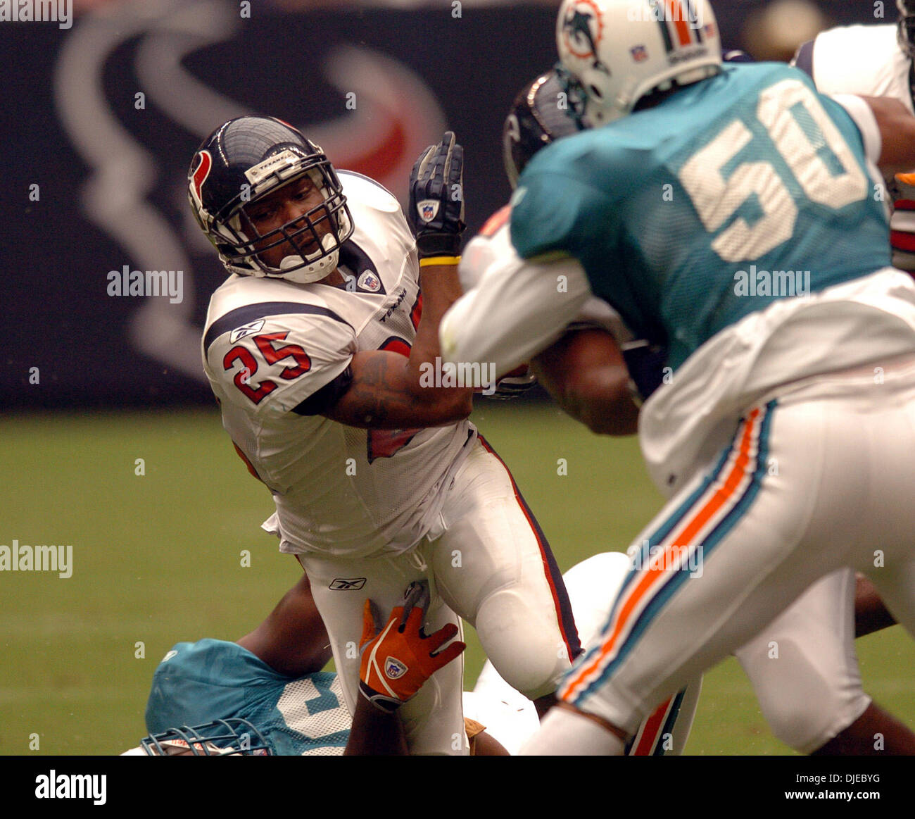 Running back Tony Hollings of the Houston Texans carries the ball