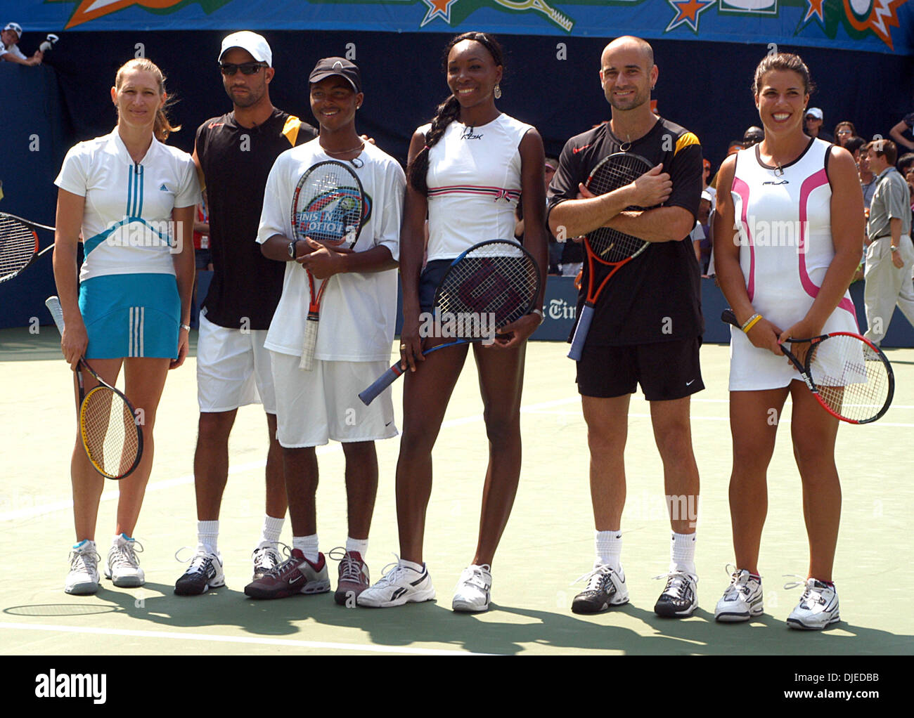 Aug 28, 2004; Flushing Meadows, NY, USA; Tennis Stars (l to r) STEFFI GRAF, JAMES BLAKE, Tennage Phenom DONALD YOUNG, VENUS WILLIAMS, ANDRE AGASSI and JENNIFER CAPRIATI at the 2004 Arthur Ashe Kids Day Ceremony at the US Open Stadium  in Flushing Meadows, NY on Saturday August 28, 2004. Stock Photo