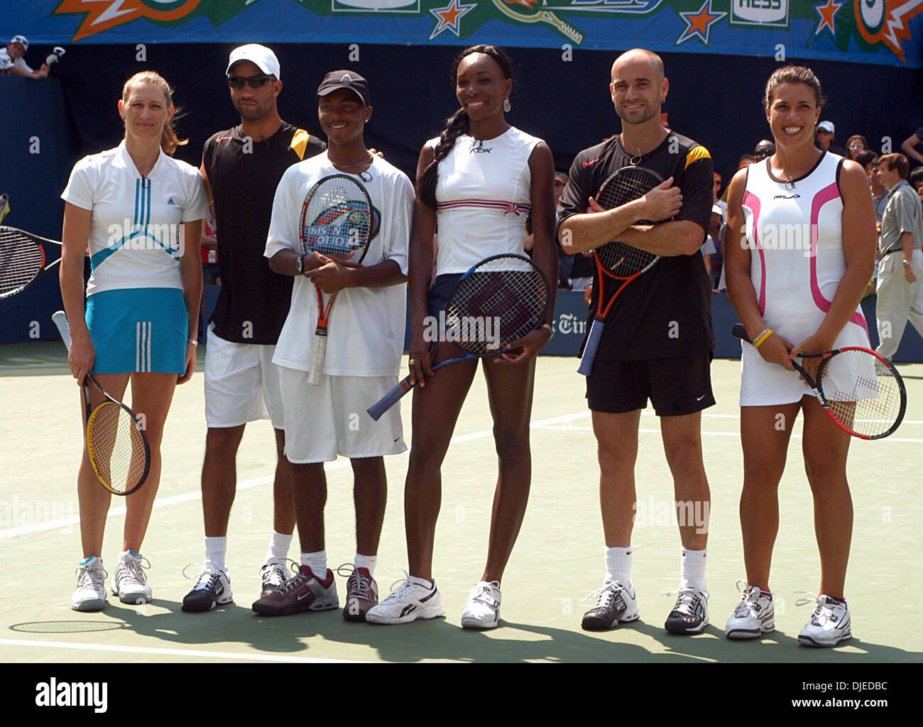 Aug 28, 2004; Flushing Meadows, NY, USA; Tennis Stars (l to r) STEFFI GRAF, JAMES BLAKE, Tennage Phenom DONALD YOUNG, VENUS WILLIAMS, ANDRE AGASSI and JENNIFER CAPRIATI at the 2004 Arthur Ashe Kids Day Ceremony at the US Open Stadium  in Flushing Meadows, NY on Saturday August 28, 2004. Stock Photo