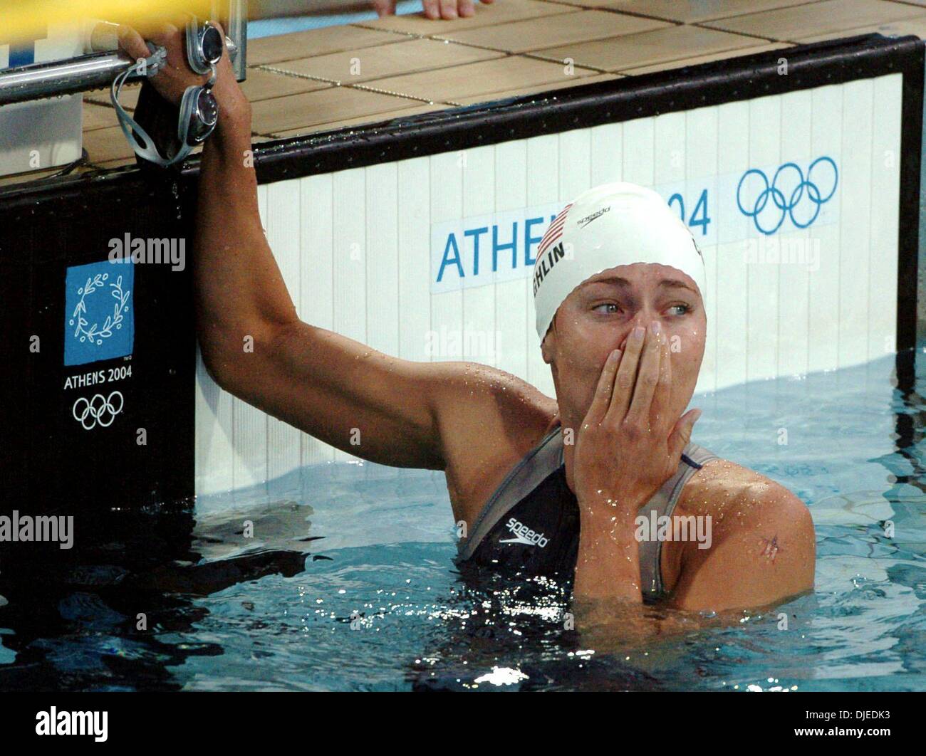 KRT SPORTS STORY SLUGGED: OLY-SWIMMING KRT PHOTO BY KARL MONDON/CONTRA COSTA TIMES (August 16) ATHENS, GREECE  -- Natalie Coughlin of the United States celebrates winning gold in the 100-meter backstroke on Monday, August 16, 2004, during the Olympic Games in Athens, Greece. (gsb) 2004 (Credit Image: Karl Mondon/Contra Costa Time/ZUMA Press) Stock Photo
