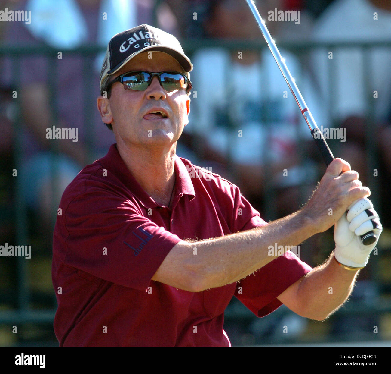Oct 16, 2004; San Antonio, TX, USA; MARK McNULTY watches his ball flight into the 18th green during the second round of the SBC Championship at Oak Hills Country Club. He is the second round leader at 12 under par. Stock Photo