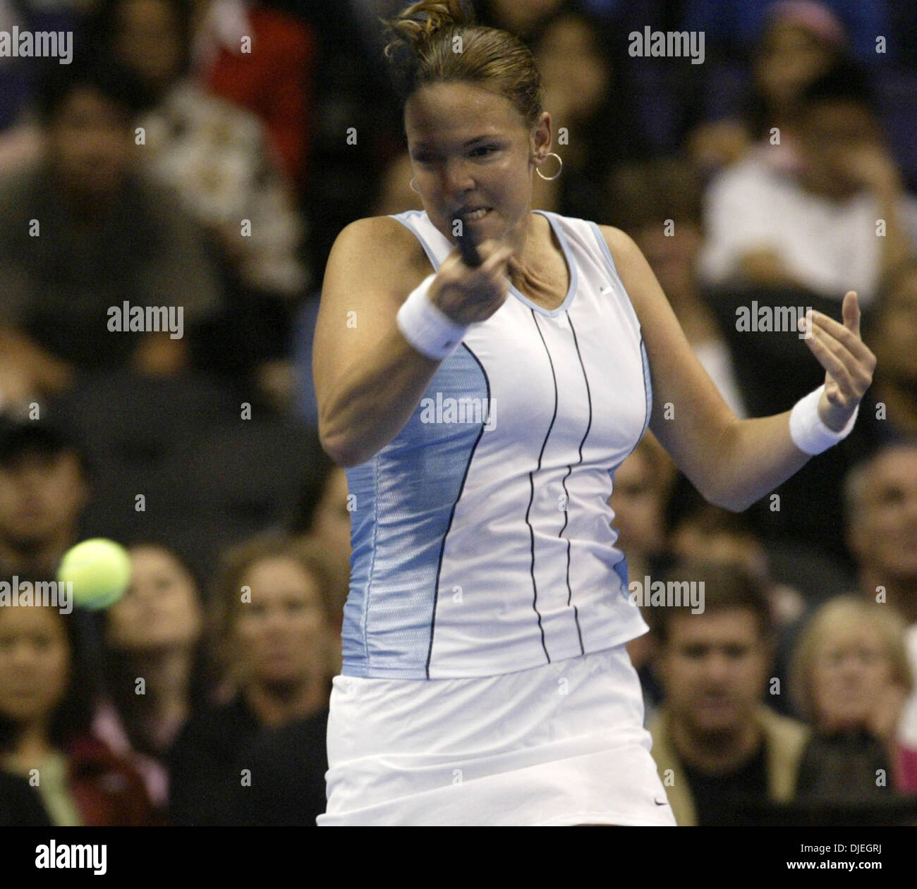 Nov 11, 2004; Los Angeles, CA, USA;  LINDSAY DAVENPORT of the USA hits a return ball to Serena Williams of the USA  during the 2004 WTA Tour Championships Saturday 13 November 2004 at the Staples Center in Los Angeles, California. Stock Photo