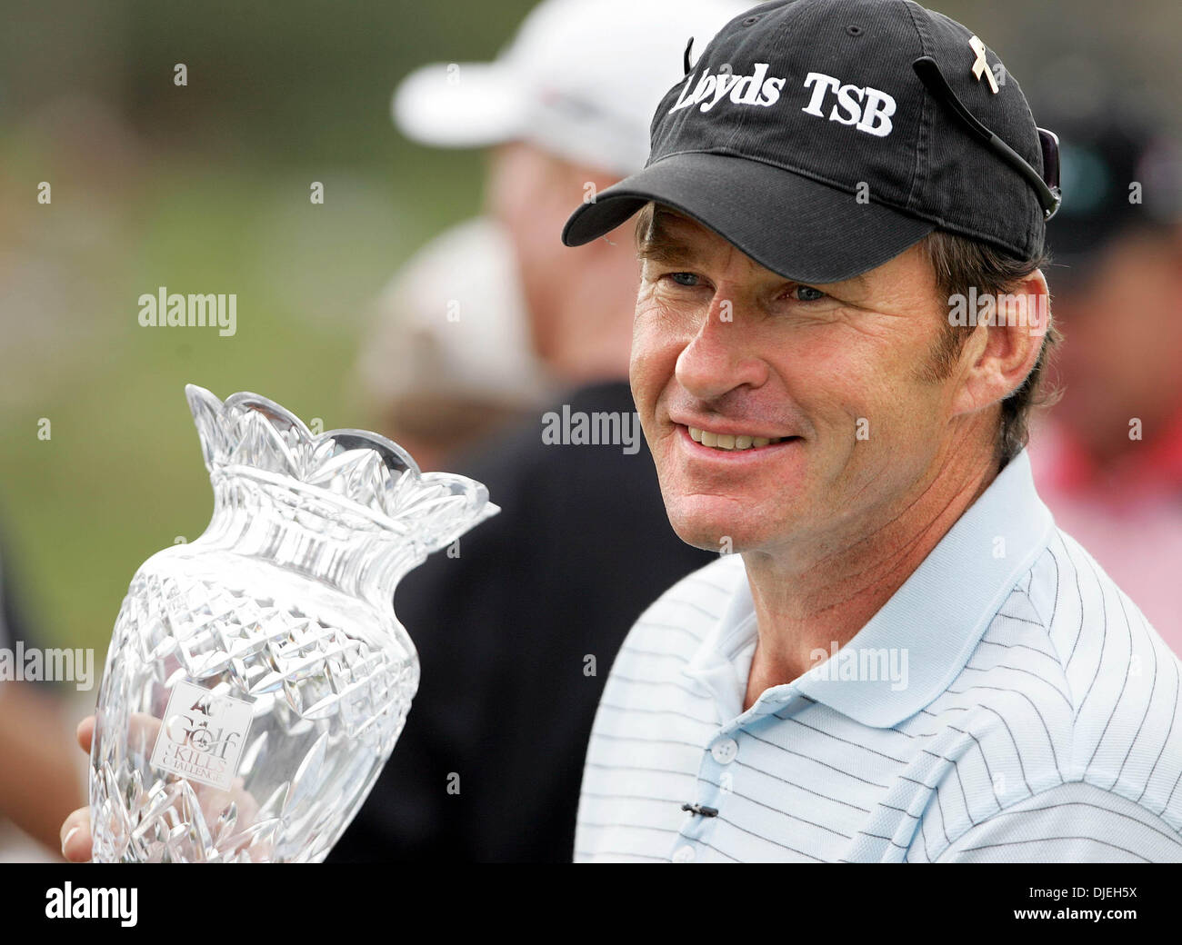 Nov 15, 2004; West Palm Beach , FL, USA; NICK FALDO holds his trophy after winning the ADT Golf Skills Challenge at the Trump International Golf Club in West Palm Beach Monday afternoon. Stock Photo