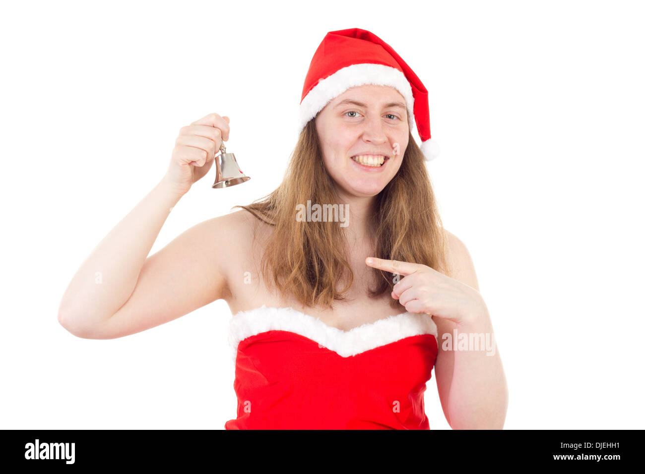 Young Mrs. Claus chiming the christmas bell Stock Photo
