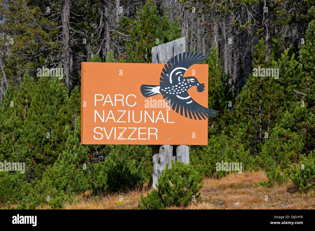 Sign Showing Logo With Nutcracker Of The Swiss National Park At Graubunden Grisons In The Alps Switzerland Stock Photo Alamy